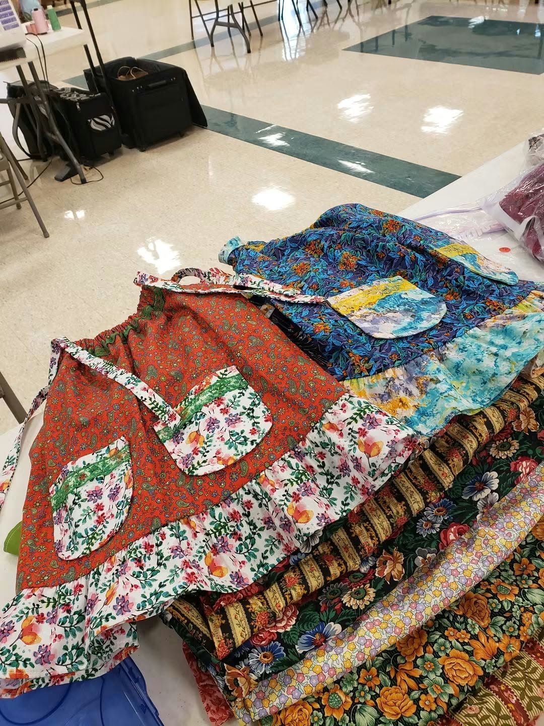 Colorful handmade dresses with pockets and ruffles, sewn for the Dress A Girl Around the World campaign